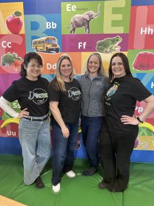 The Achievement Center of LECOM Health Early Intervention team posing at the expERIEnce Children's Museum in Erie, PA