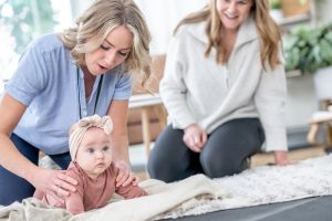 Physical therapist providing early intervention services